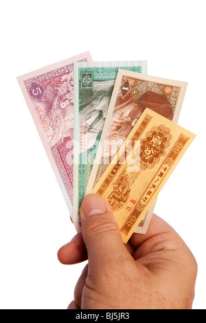 Geld männliche Hand, die Handvoll alte chinesische Währung Stockfoto