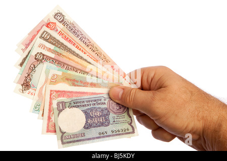 Geld männliche Hand, die Handvoll alte indische Währung Stockfoto