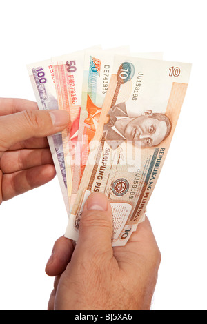 Geld männliche Hand, die Handvoll Philippinen Währung Stockfoto