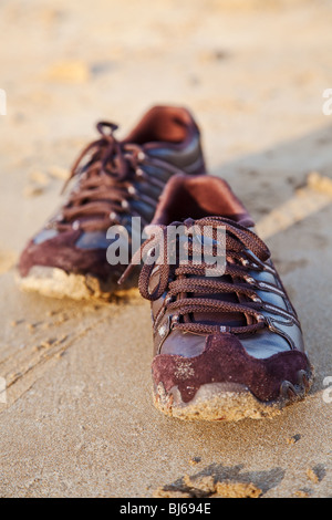 Schuh und Sand Hintergrund Stockfoto