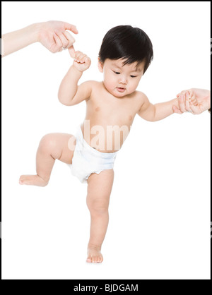 Babys erste Schritte Stockfoto