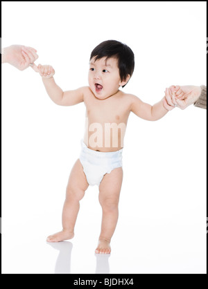 Babys erste Schritte Stockfoto