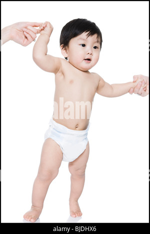 Babys erste Schritte Stockfoto