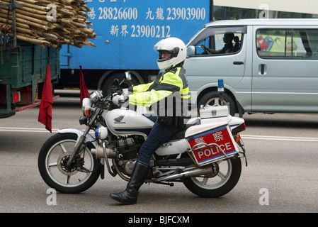 Polizist auf dem Motorrad, Hong Kong, China Stockfoto