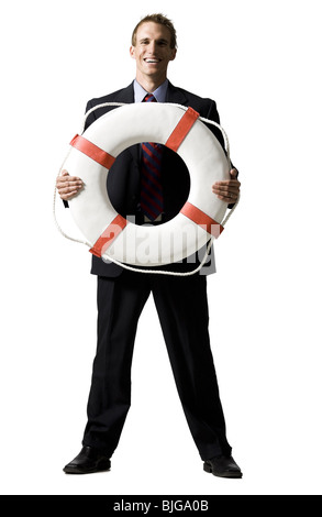 businessman holding a life preserver Stockfoto