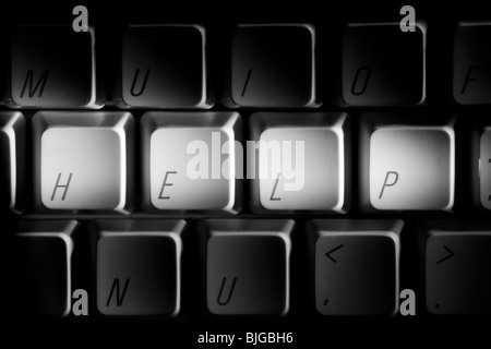 Hilfe geschrieben am Computer-Tastatur-Tasten Stockfoto