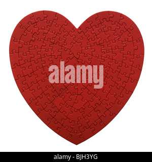 rotes Herz geformt Jigsaw Puzzle auf weißem Hintergrund Stockfoto