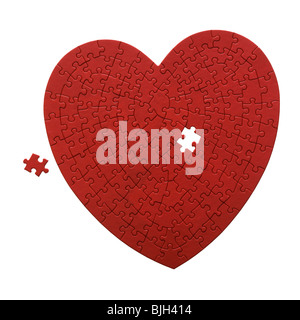 rotes Herz geformt Jigsaw Puzzle auf weißem Hintergrund Stockfoto