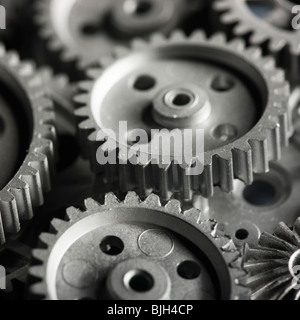 Zahnräder auf Zahnräder aufgetürmt Stockfoto