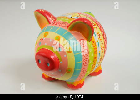 Bunt, fröhlich und eher kitschig Sparschwein. Stockfoto