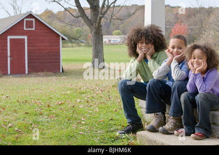 Familie auf Veranda Stockfoto