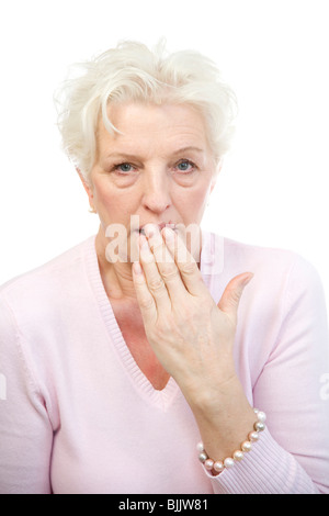 Frau hielt ihre hand in Horror vor den Mund Stockfoto