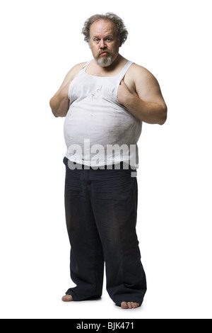 Zerzausten Mann mit den Händen auf Topfbauch Stockfoto