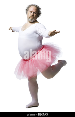 Übergewichtige Menschen im Tutu tanzen Stockfoto