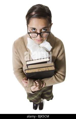 Weibliche Bibliothekar mit Brille und Büchern totschweigen Stockfoto