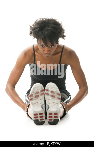 Frau, dehnen Stockfoto