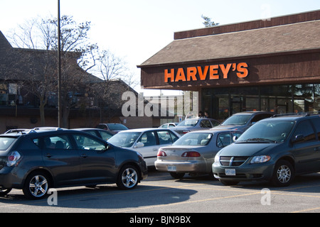 Harvey Harveys "Harveys" Fast-Food Burger Restaurant ungesunde Pommes Koks ölige Fett Mcdonald Burger king billig billig Familie Stockfoto