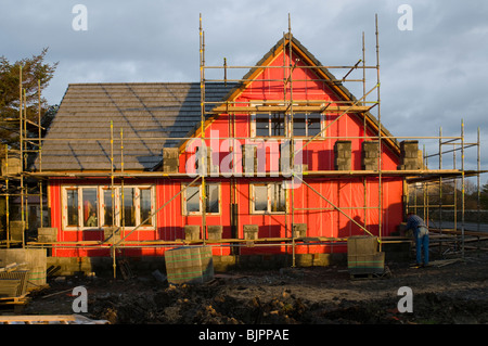 Äußere Rahmen eines Holzhauses im Bau in Dorf von Mey, Caithness, Schottland, Großbritannien Stockfoto