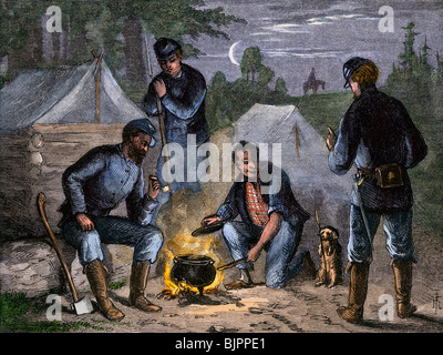 Union Soldaten Kochen über dem offenen Lagerfeuer während des Bürgerkriegs. Hand - farbige Holzschnitt Stockfoto