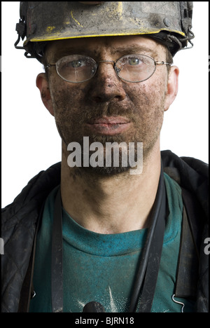 Bergmann mit Taschenlampe Helm Stockfoto