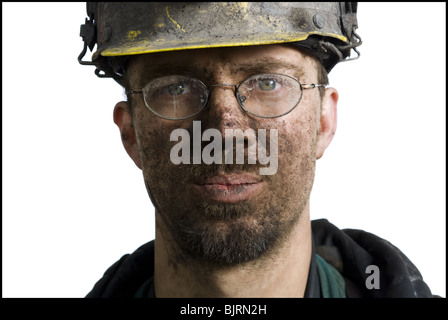 Bergmann mit Taschenlampe Helm Stockfoto