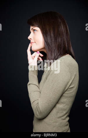 Studio-Porträt der jungen Frau Stockfoto