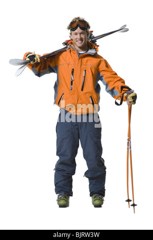 Männlichen Skifahrer in orange Skijacke Stockfoto