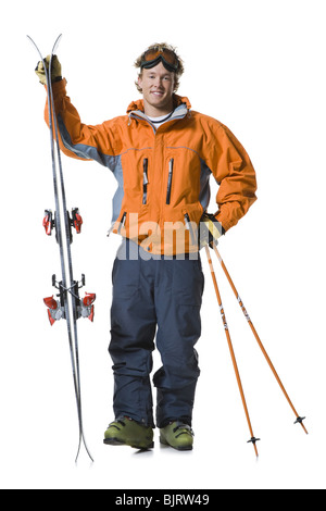 Männlichen Skifahrer in orange Skijacke Stockfoto