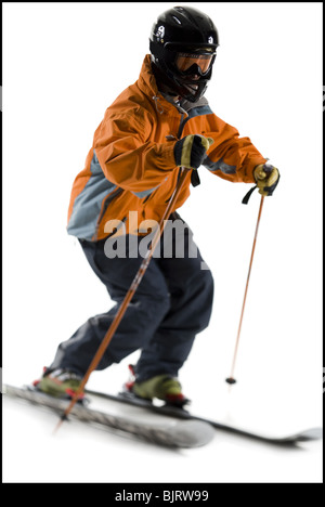 Männlichen Skifahrer in orange Skijacke Stockfoto