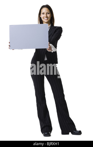 Frau mit einem leeren Schild Stockfoto