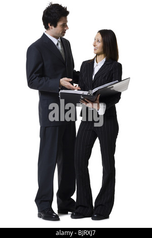 Unternehmer und Unternehmerin überprüfen von Dokumenten Stockfoto