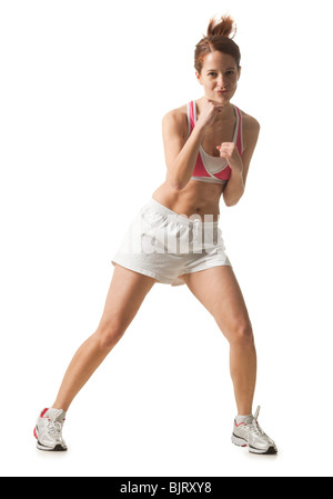Junge Frau tun Boxen bewegt, Studio gedreht Stockfoto