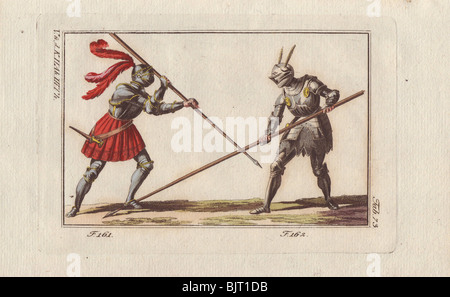 Zwei Ritter in Rüstung zu Fuß kämpfen ein Duell mit Lanzen in einem Turnier. Stockfoto