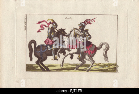 Zwei Ritter in Rüstung auf dem Pferderücken kämpfen ein Duell mit einer Schlinge in ein Turnier. Stockfoto