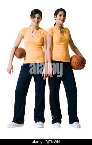 Schwestern mit Sportartikel Stockfoto