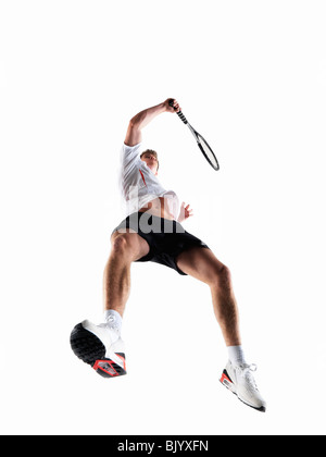 Mann mit dem Tennisspielen Stockfoto