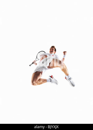 Mann mit dem Tennisspielen Stockfoto
