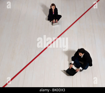 Business-Mann und Frau auf laptops Stockfoto