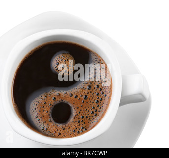 Schaum in eine Tasse Kaffee als Symbol des Yin yang Stockfoto