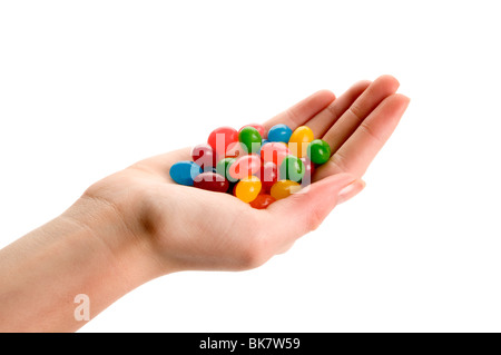 Hand mit Gummibärchen Stockfoto