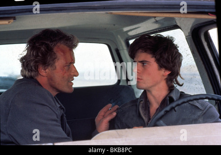 HITCHER (1986) RUTGER HAUER, C THOMAS HOWELL CREDIT ITC (NUR INSERATE) TTHR 002 Stockfoto