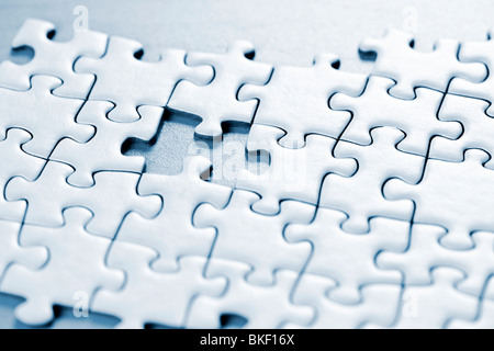 Jigsaw Puzzle zusammengebaut mit ein Stück fehlt Stockfoto