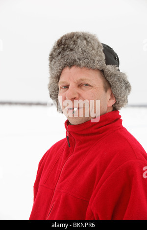 Saami Mann beim Rentier Racing World Cup, während Sámi Osterfestspiele in Kautokeino in Finnmarksvidda im arktischen Norwegen Stockfoto