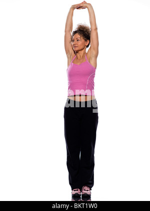 schöne Reife Frau auf isolierten weißen Hintergrund dehnen alles tun Stockfoto