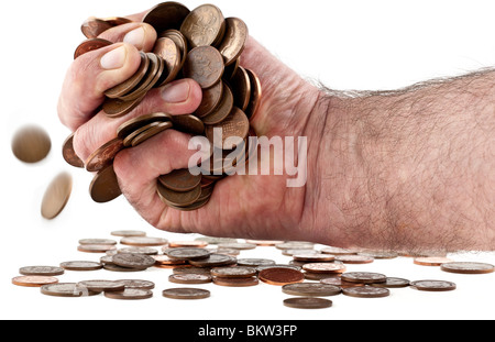 Mans Hand gefüllt mit britischen Münzen Kupfer Stockfoto