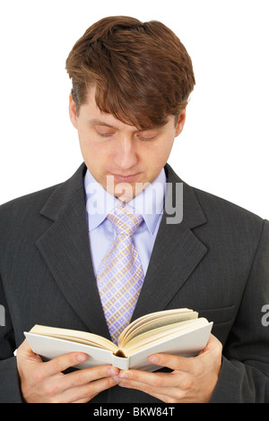 Der junge Mann ein Buch lesen, isoliert auf weißem Hintergrund Stockfoto