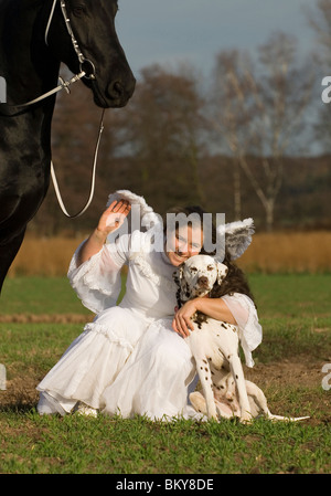 Engel, Friesen und Dalmatiner Stockfoto