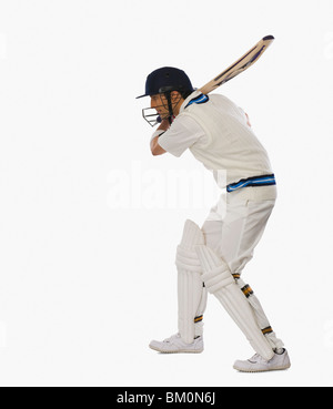 Cricket Batsman spielen einen Schuss Stockfoto
