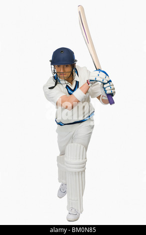 Cricket Batsman spielen einen Schuss Stockfoto