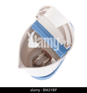 Heizelement von einem elektrischen Wasserkocher, isoliert auf weiss Stockfoto